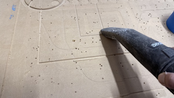 Clean off the spoil board and stock